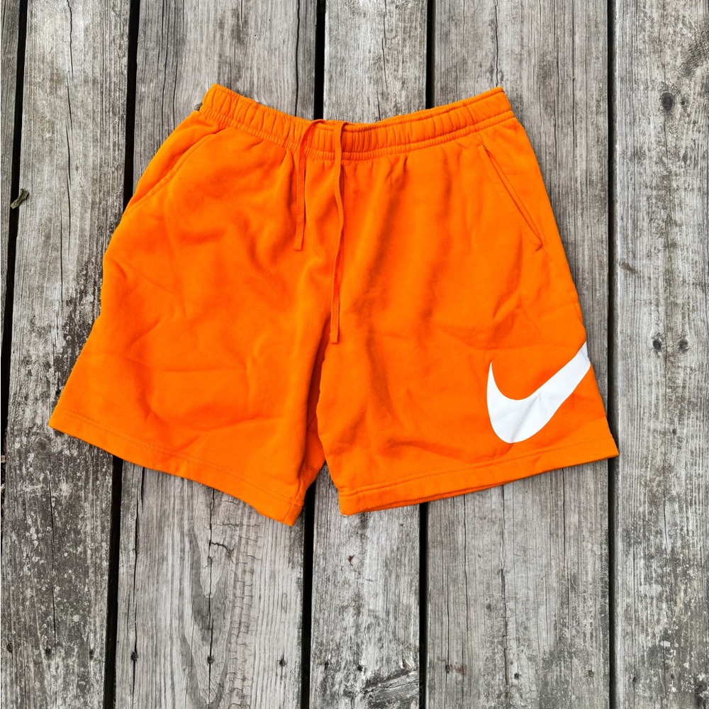 Nike Vibrant Orange Shorts with White Swoosh